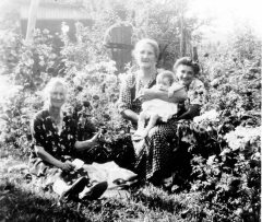 Zofia and friends in the flower garden. Copyright 2103 Genealogy Sisters