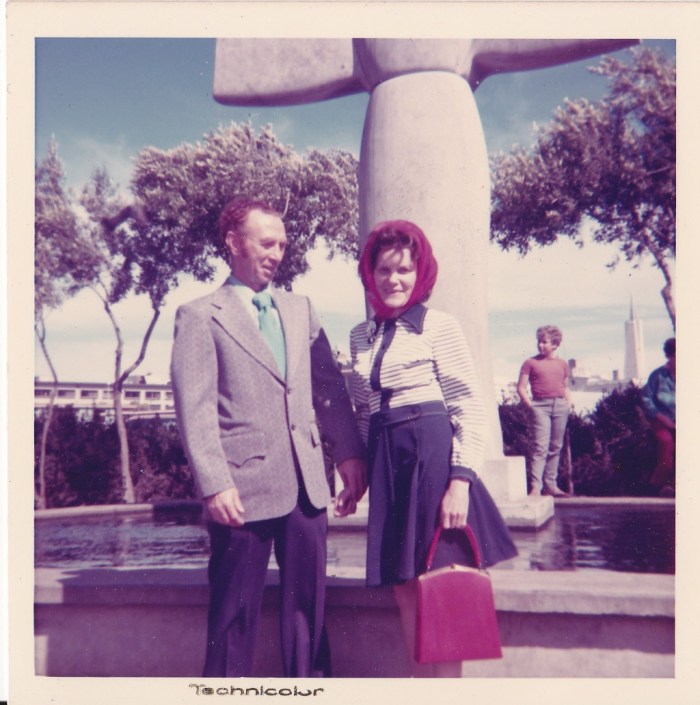 Peter Doran and Lillian. "This huge sculpture in the background was by Benny Bufino an Italian artist. The statue is of St. Francis".